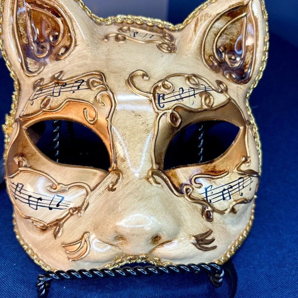 Elegant Gold Cat Mask with Musical Accents